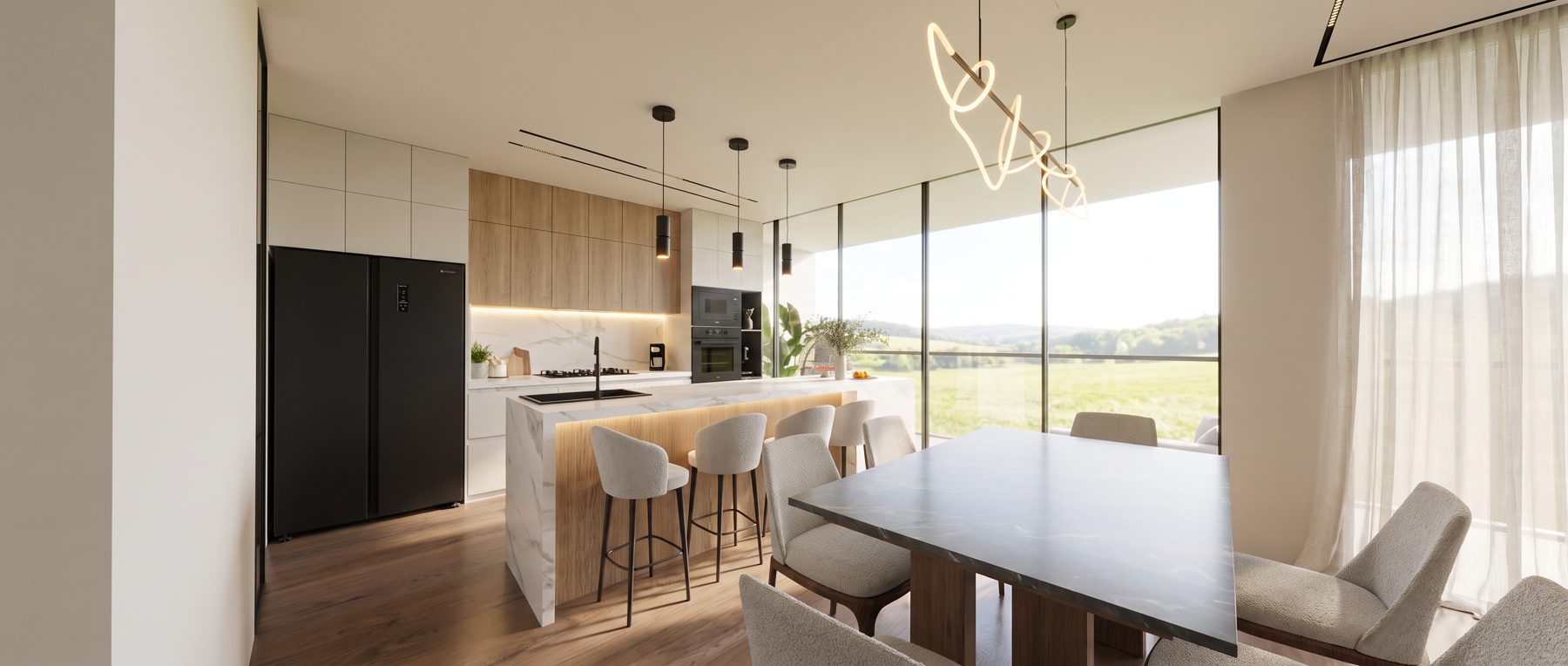 Cocina con isla de mármol y frente de roble, comedor y mampara con vista al valle